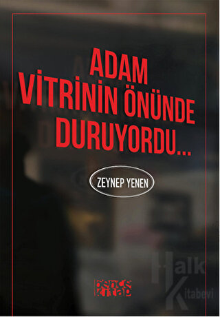 Adam Vitrinin Önünde Duruyordu